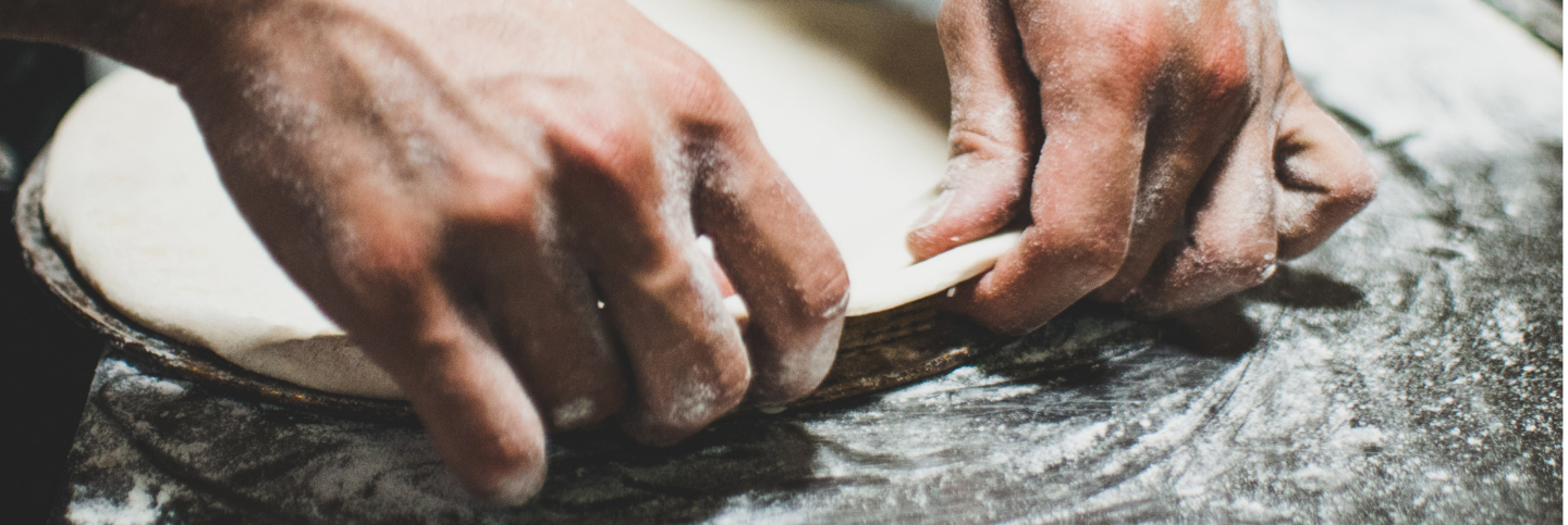 making pizza crust by hands